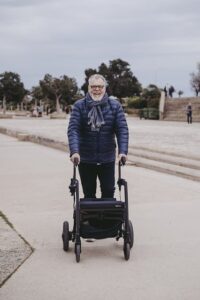 Man using a mobility device to enjoy a public space